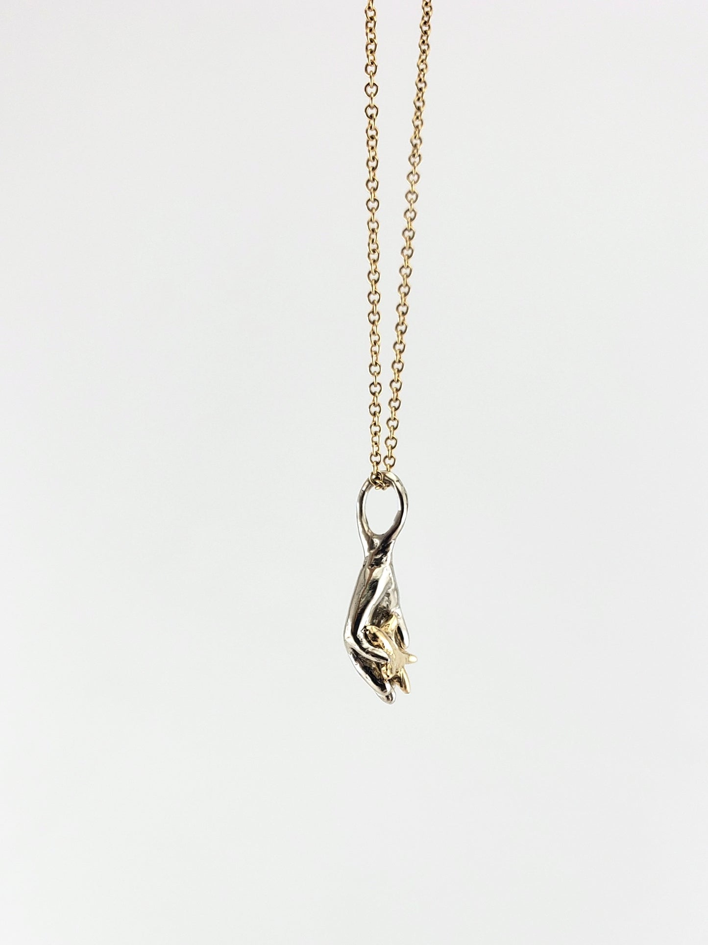 ‘Hand in the Stars’ Pendant